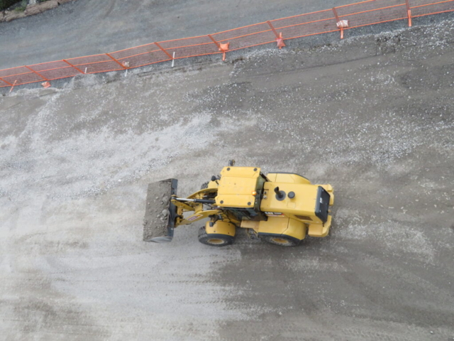 Hauling soil to build-up the south embankment