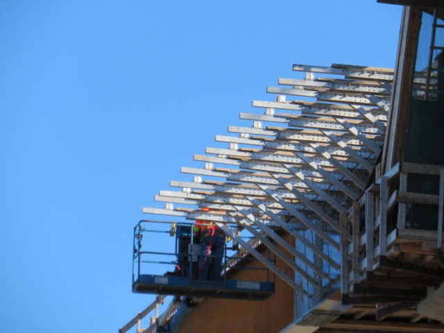 View from below of installed work platform brackets