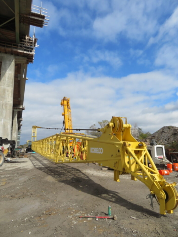 Lowering the 200-ton crane boom to start dismantling the crane