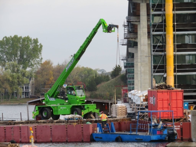 Using the Manlift to remove materials from the boat