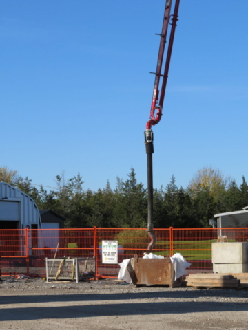 Releasing slurry into the containment bin