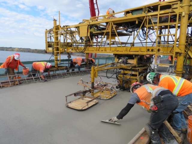 Concrete deck placement, concrete finisher, finishing the edges