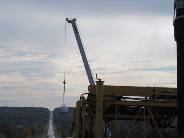 160-ton crane lifting the water tote to the deck