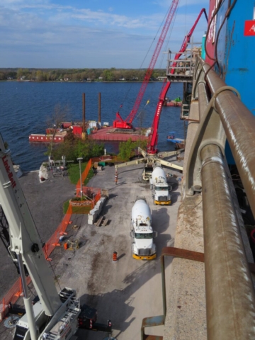 Top view, concrete pump truck and concrete trucks