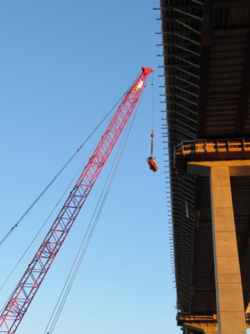 110-ton crane lifting the frost fighter to the bridge deck