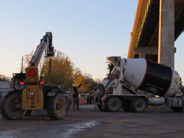 Backing-up the concrete truck to the hopper