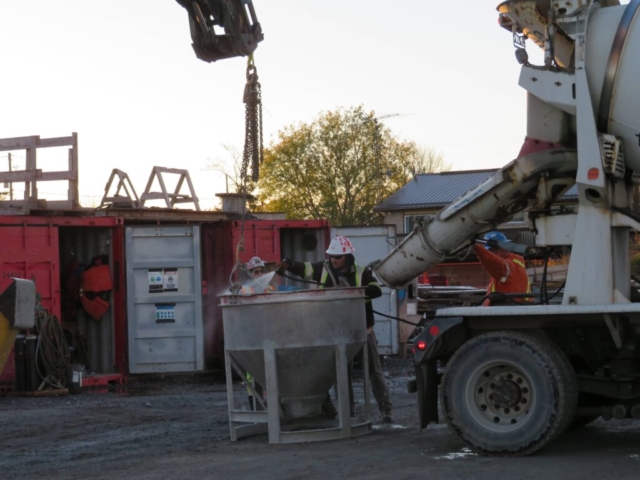 Pre-wetting the concrete hopper