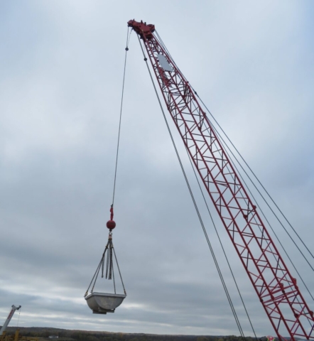 Lowering the containment bin from the deck