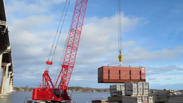 110-ton crane removing a section of the barge