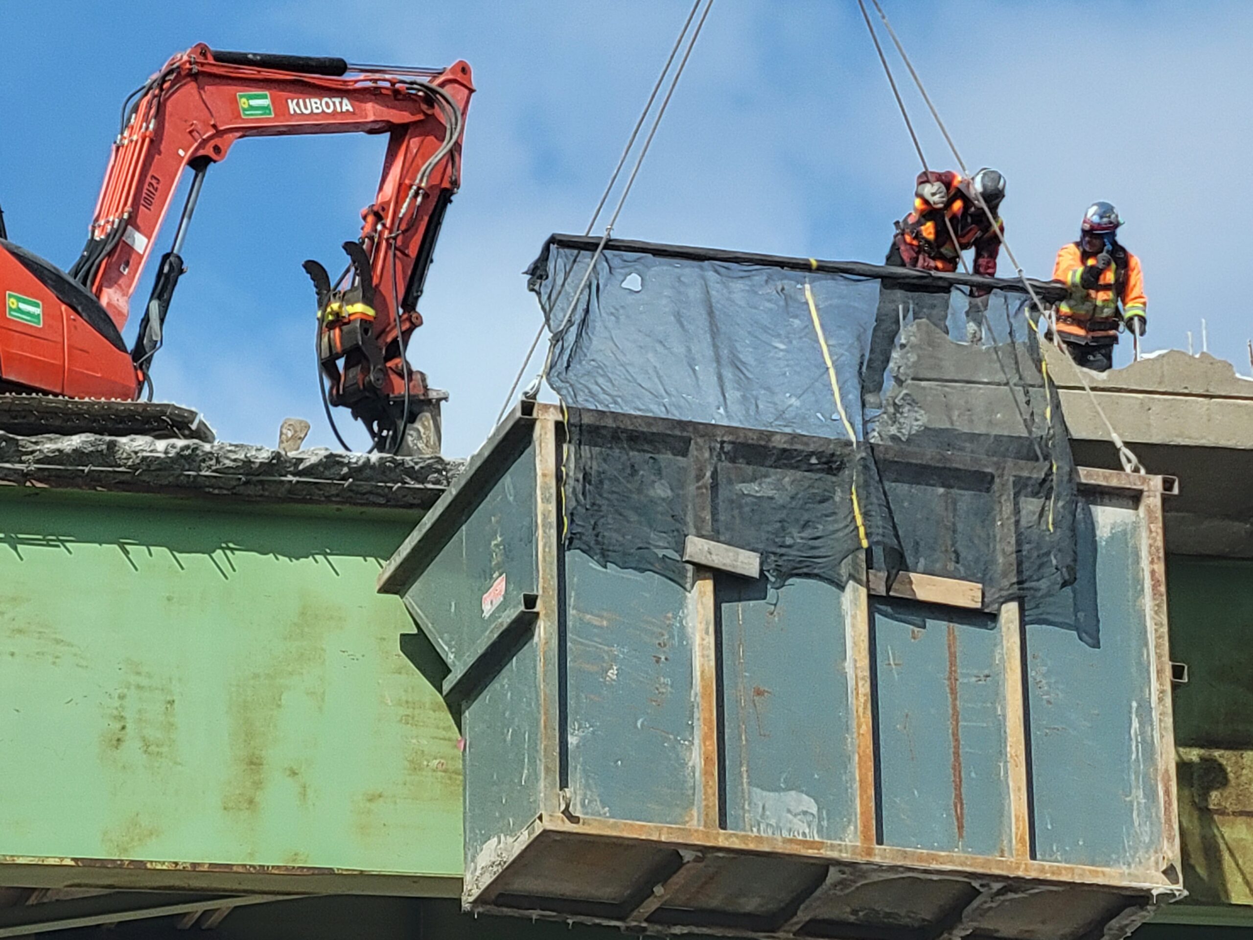 Close-up of the containment bin during overhang removals