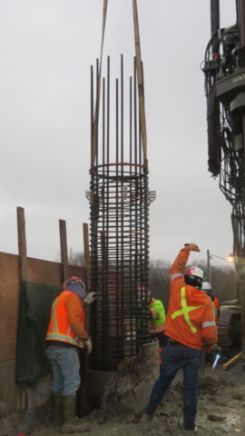 Lowering the cage into the caisson liner