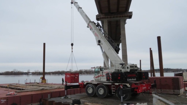 160-ton crane lowering the barge section onto the barge