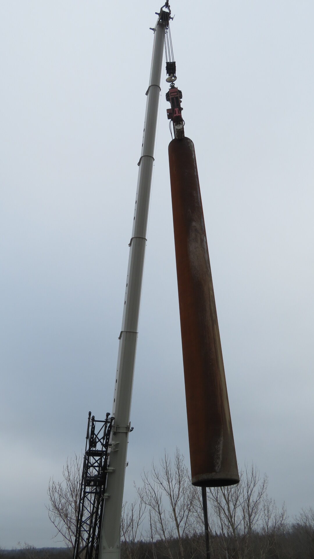 160-ton crane lifting the caisson liner to the bridge deck