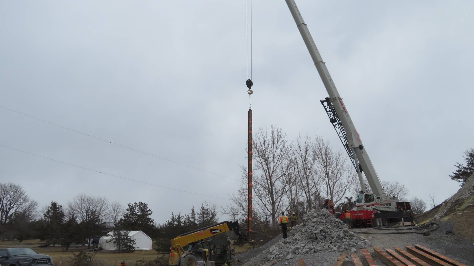 160-ton crane preparing for H-pile installation