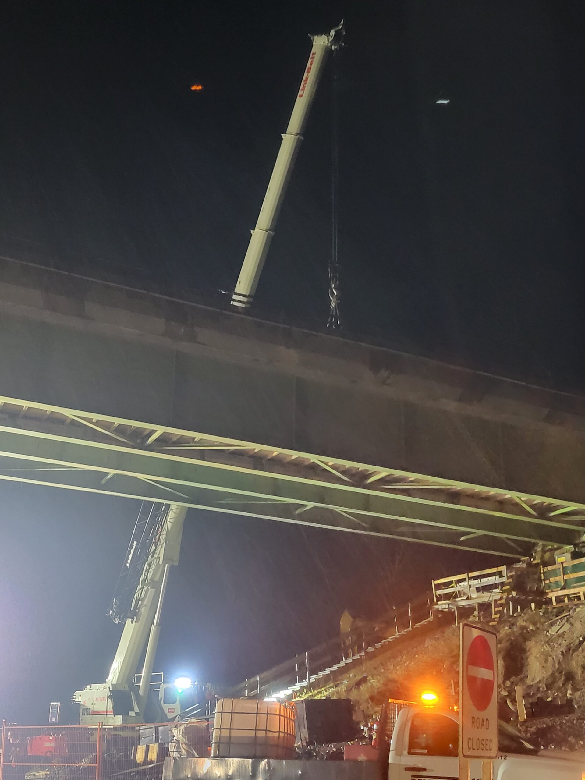 160-ton crane hooked-up to the approach girder for removal