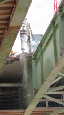 Close-up from below of concrete deck removal