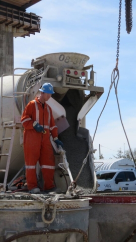 Filling the hoppers with concrete