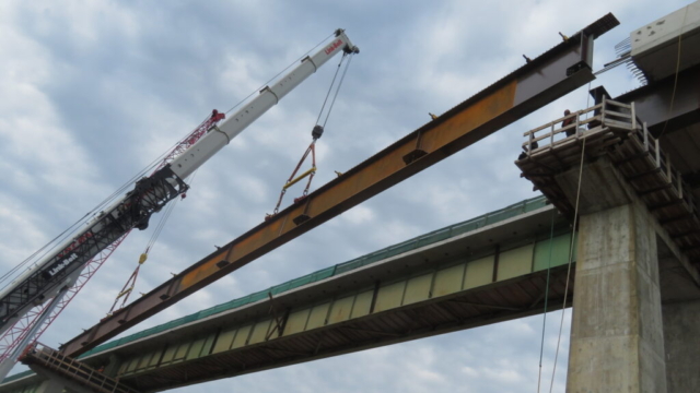 Moving the girder section into place