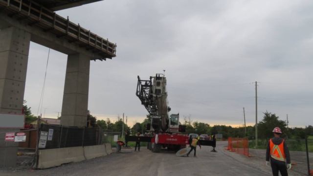 Moving the 160-ton crane into place for girder erection