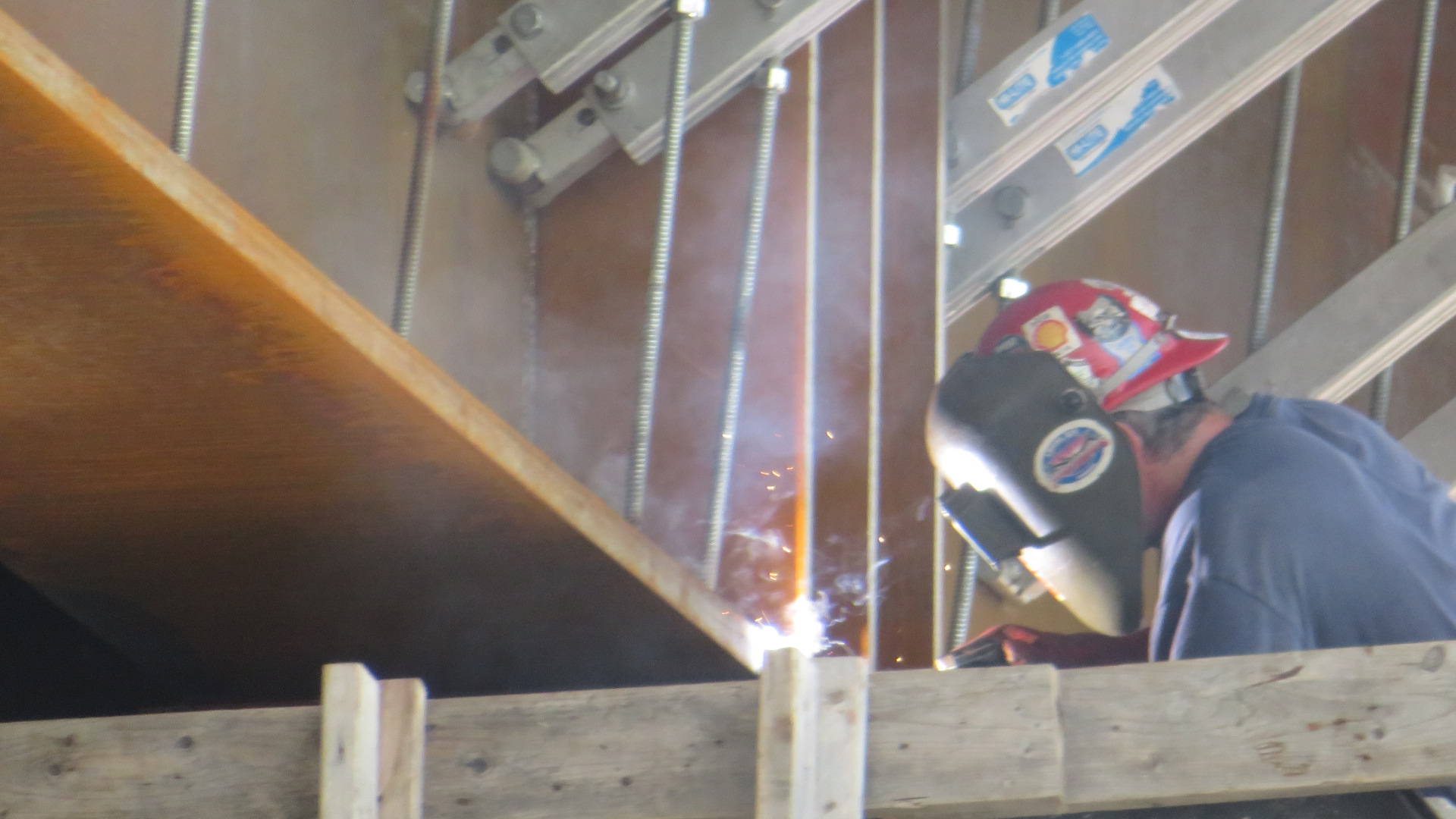 Welding the girder to the bearings