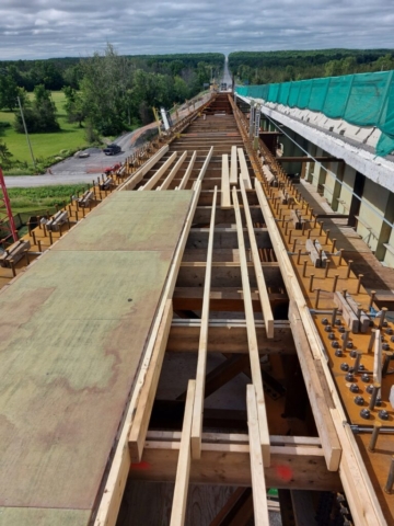 View south of the start of the bridge formwork and installed girders