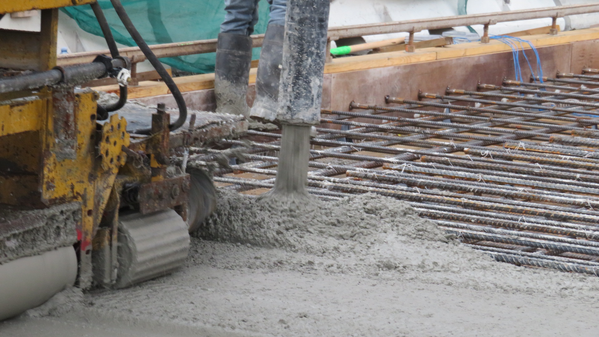 Concrete pump placing concrete into the formwork