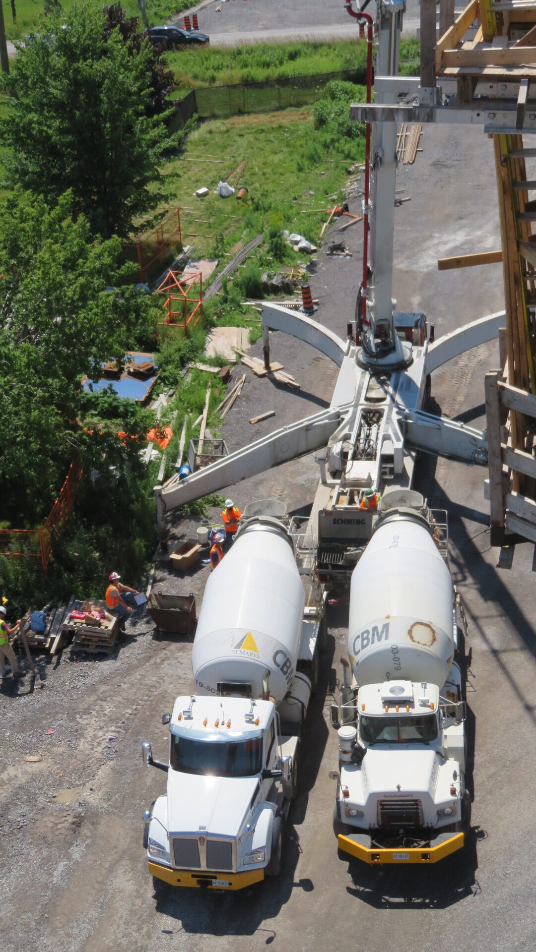 Top view of concrete pump and trucks