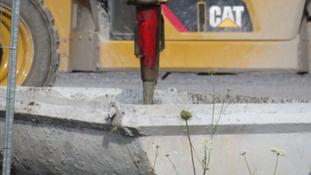 Close-up, releasing slurry from the concrete pump truck