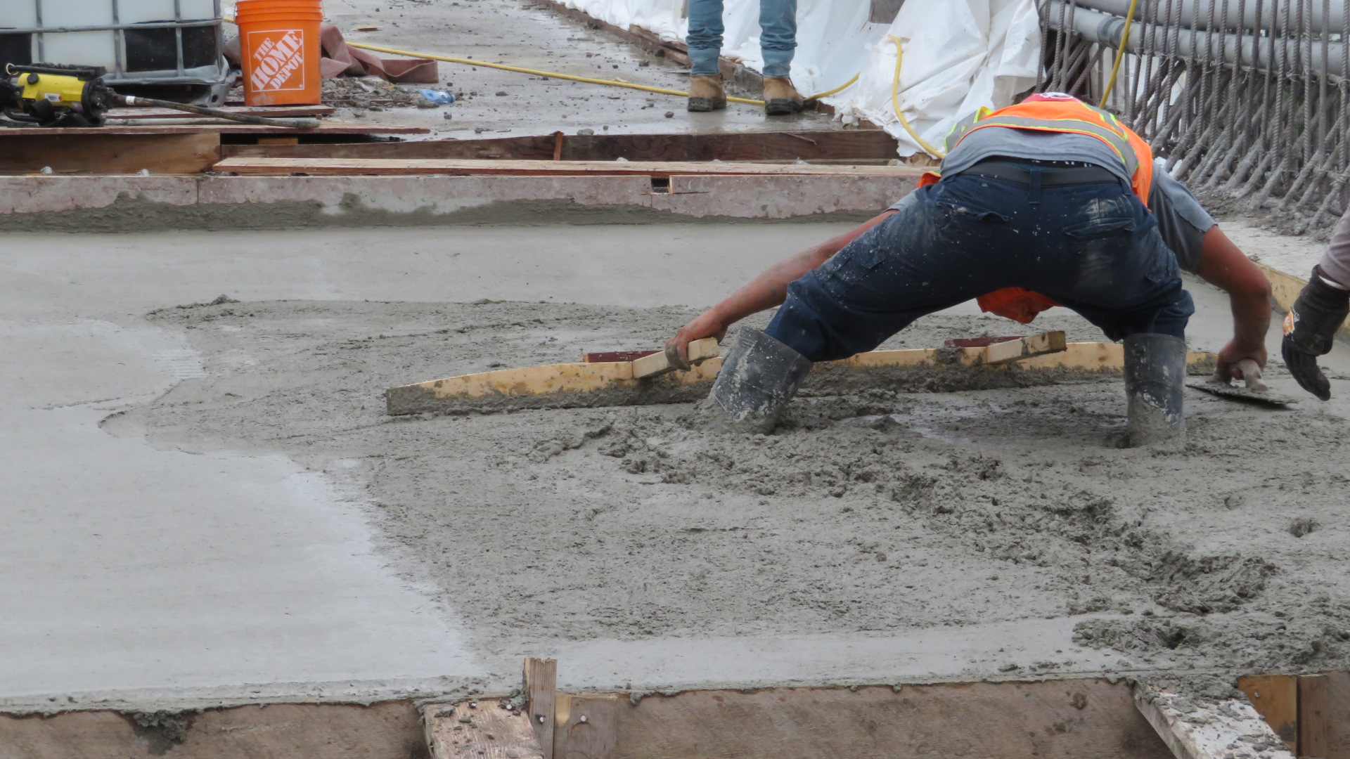 Close-up, finishing the approach slab