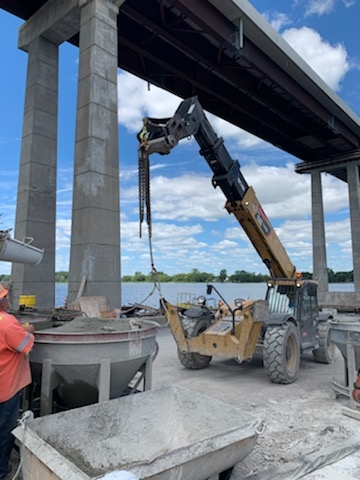 Hooking-up the telehandler for pier 9 concrete placement