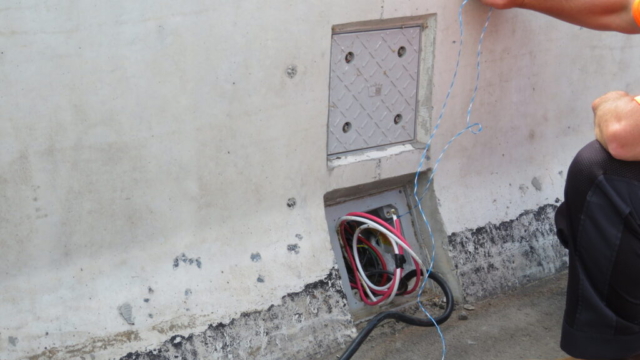 Running the electrical through the barrier wall