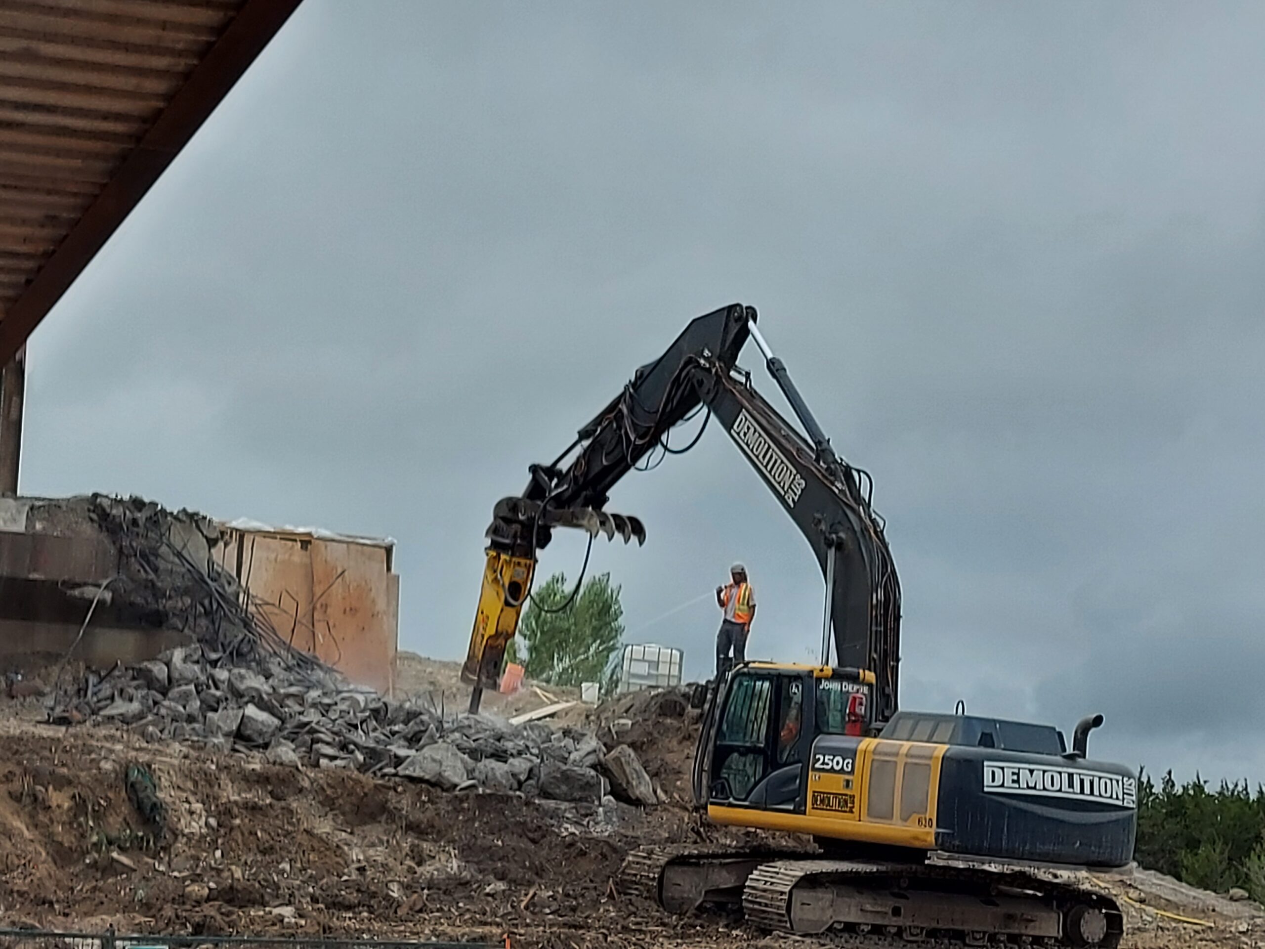 South abutment demolition, hoe-ramming