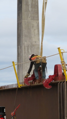 Installing the Crosby clamp onto the girder