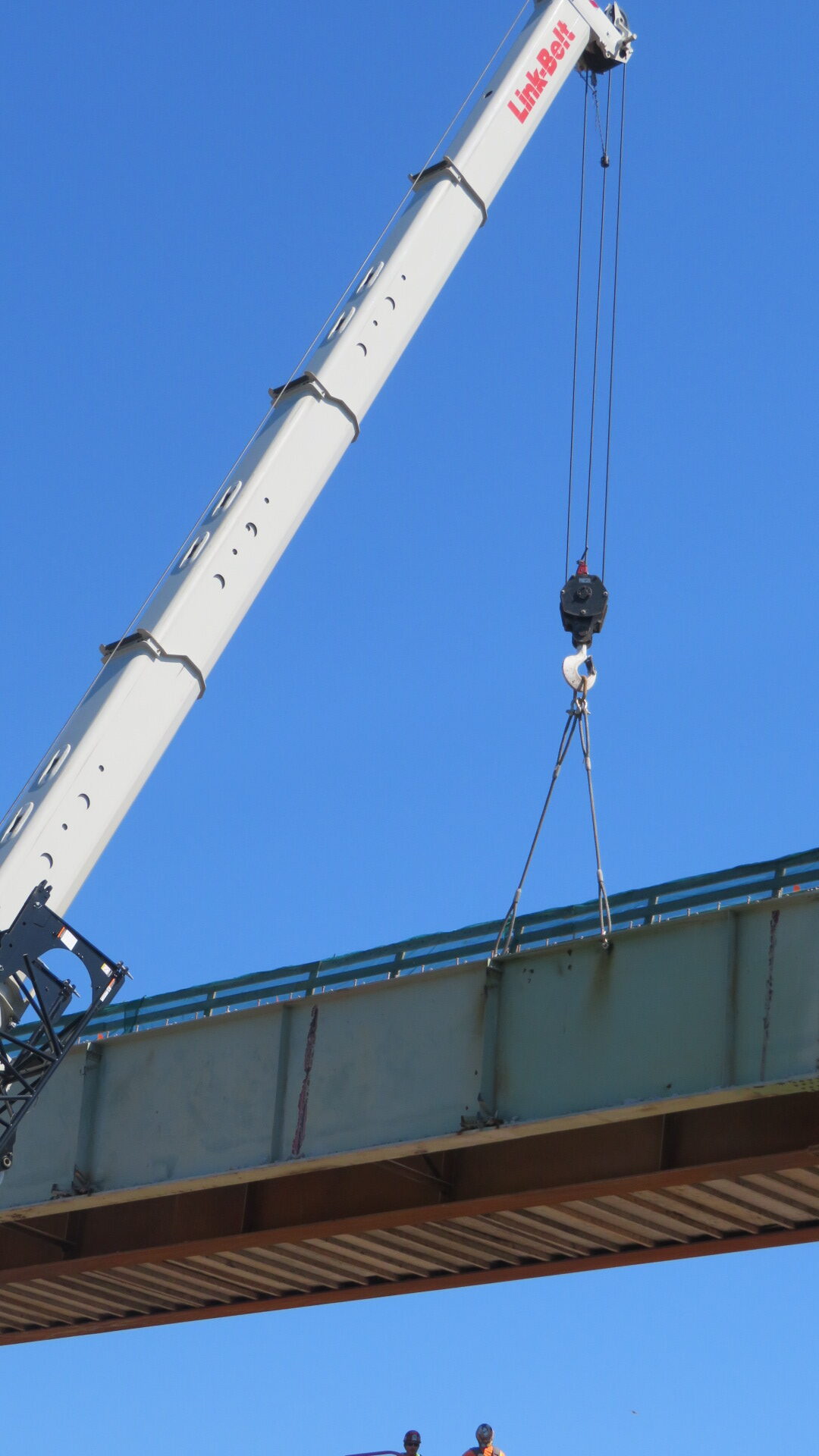 160-ton crane hooked up to the second girder section