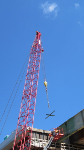 110-ton crane removing the cut bracing