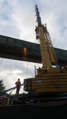200-ton crane, torch cutting the girder