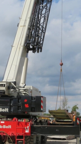 View north of 160-ton crane loading the girder onto the truck