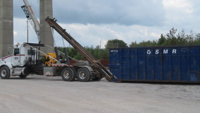 Delivering the bin for removed girder sections