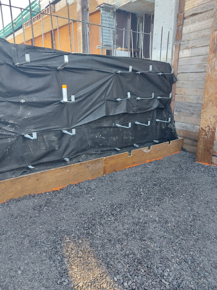 Tie strips and geotextile at the south abutment