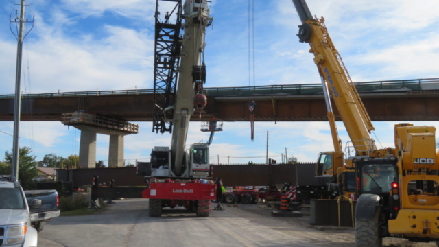 Moving the girders into place for installation