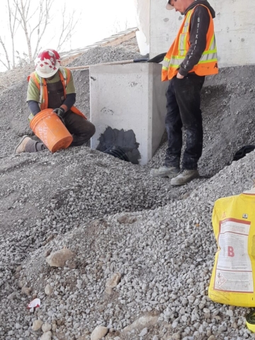 Installing a catch basin on the south abutment