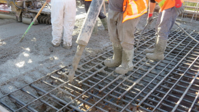 Close-up, pumping concrete into the formwork