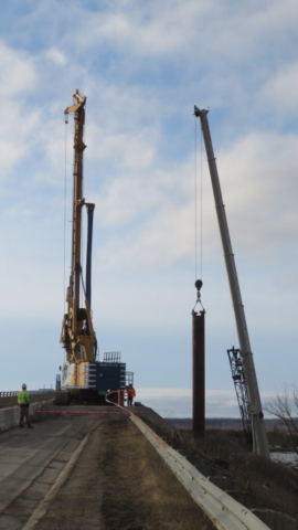 160-ton crane lifting the caisson liner into place
