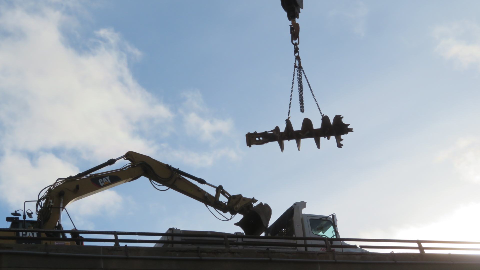 160-ton crane lifting the auger to the bridge deck