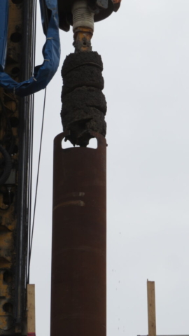 Close-up, removing the auger