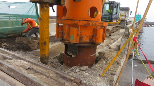 Drilling the second caisson liner