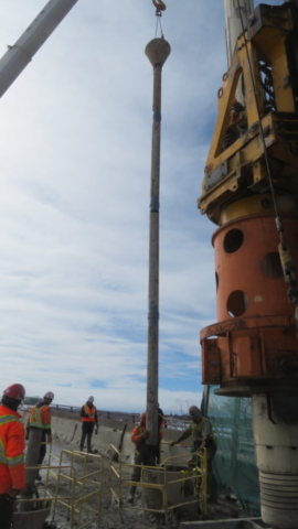 160-ton crane lowering the concrete tremie pipe