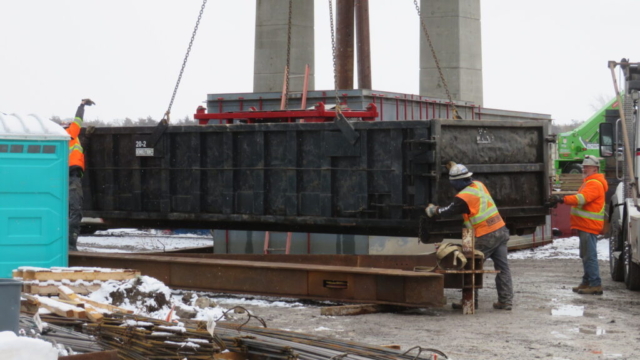 160-ton lowering the bin into place
