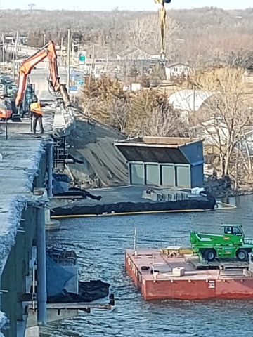 200-ton crane lifting the containment bin