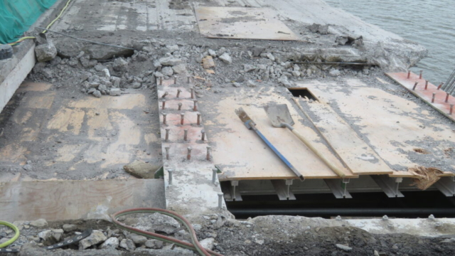 Expansion joint removal, containment scaffolding